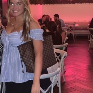 Blue and white striped top